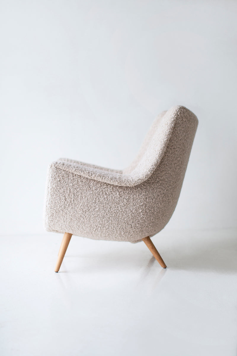 Full view of a Lawrence Peabody Danish lounge chair against a white backdrop