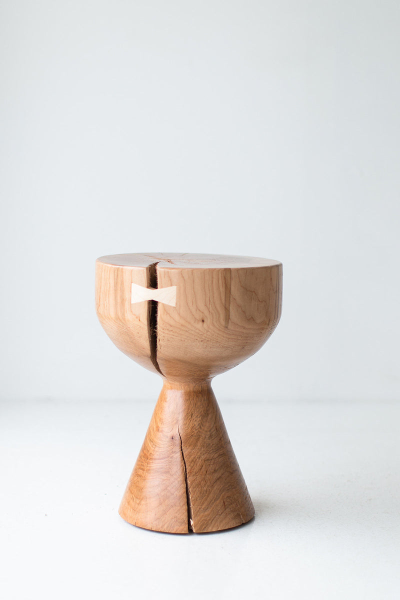 Detail of a bowtie set across a crack in the seat