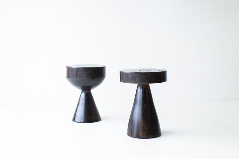 Full view of the modern stool against a neutral backdrop
