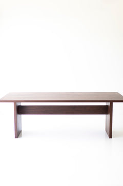 Angled detail view of the Toko modern walnut dining table