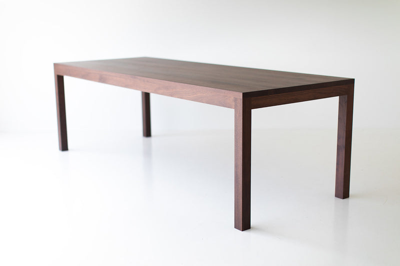 The Christopher modern luxury walnut dining table by Bertu Home, front view