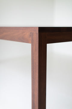 Modern walnut dining table, detail of the commercial-grade matte finish
