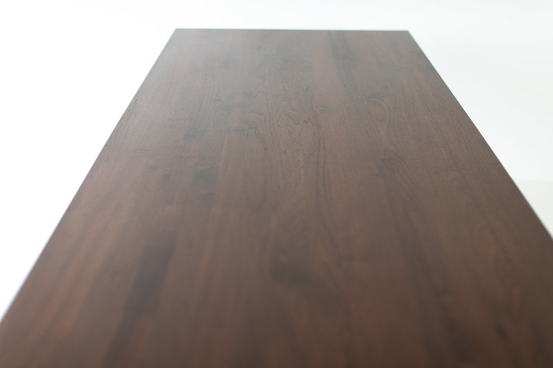 Modern luxury solid walnut dining table shown from above