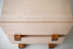 Detail of the horizontal maple plank drawer front on a Santa Fe nightstand