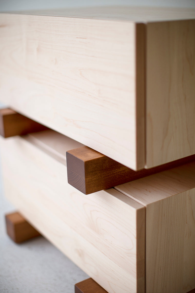 Full view of a Santa Fe maple nightstand against a neutral wall