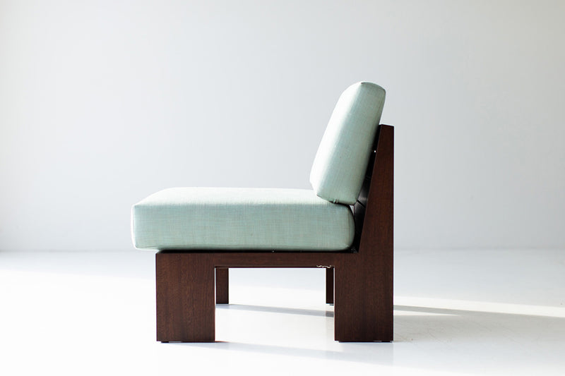 Organic modern mahogany outdoor lounge chair in walnut finish, front view