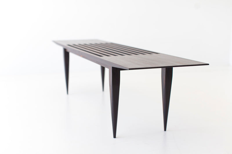 Modern slatted bench styled in a living room setting