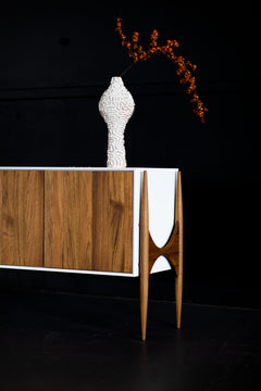 Close-up of the teak wood grain on the modern luxury Cambre credenza