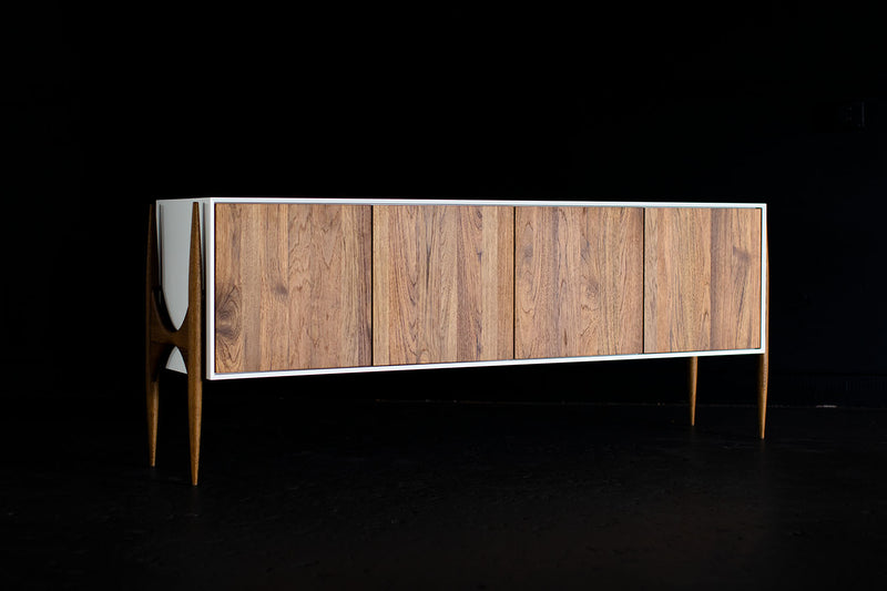 Angled view of the modern luxury teak Cambre credenza