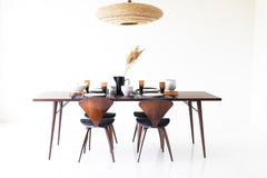 Side profile of the modern luxury New York walnut dining table