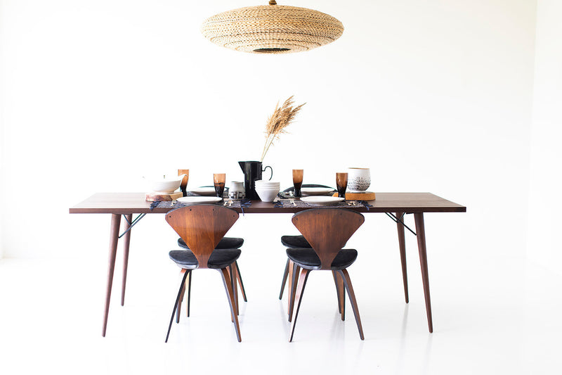 Side profile of the modern luxury New York walnut dining table