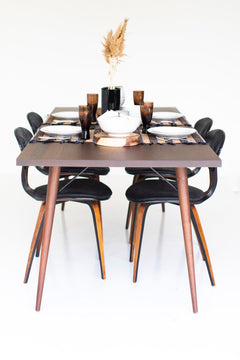 Detail of the tapered legs on the modern luxury New York dining table