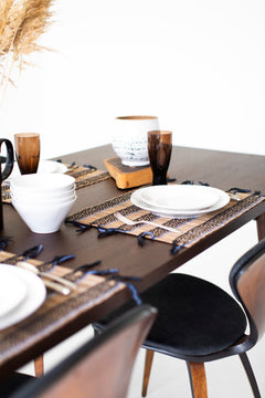 Modern luxury New York walnut dining table in a styled dining room