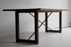 Detail of the black walnut wood grain on the modern dining table