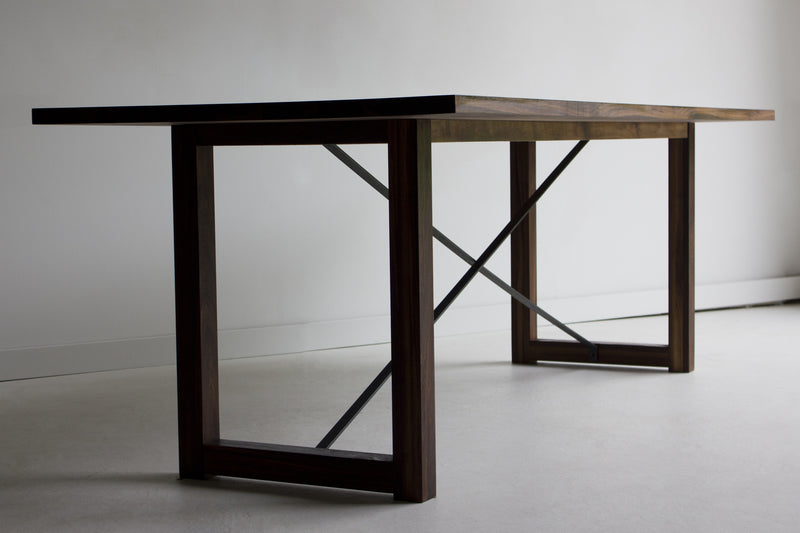 Detail of the black walnut wood grain on the modern dining table