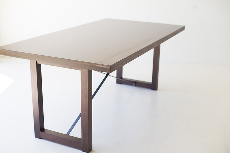 Side profile of the modern luxury walnut dining table by Bertu Home