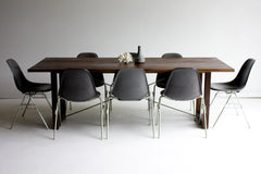 Modern luxury walnut dining table shown from above