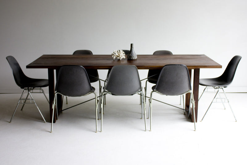 Modern luxury walnut dining table shown from above