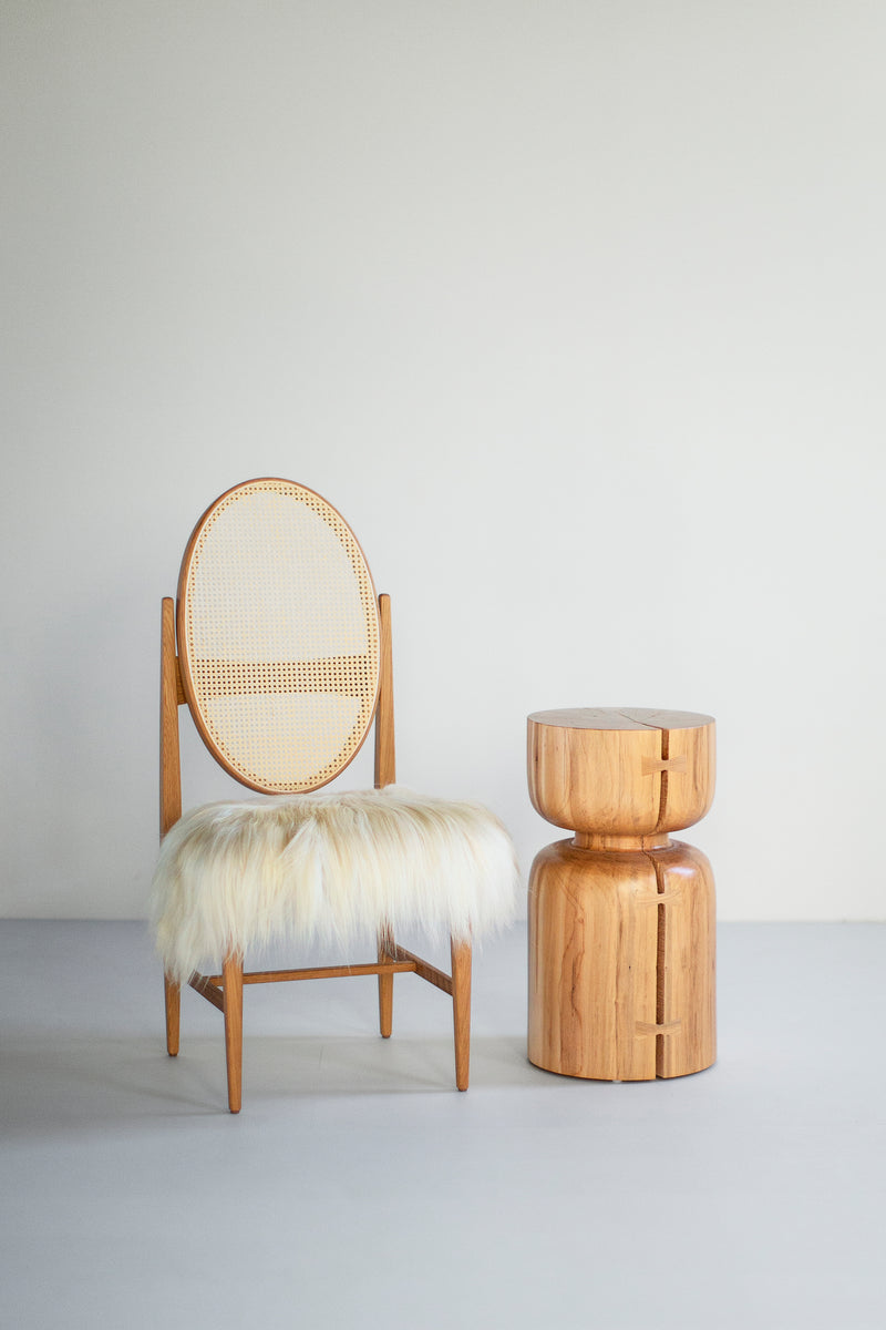 Close-up of the maple grain and natural cracking on a Roma stool