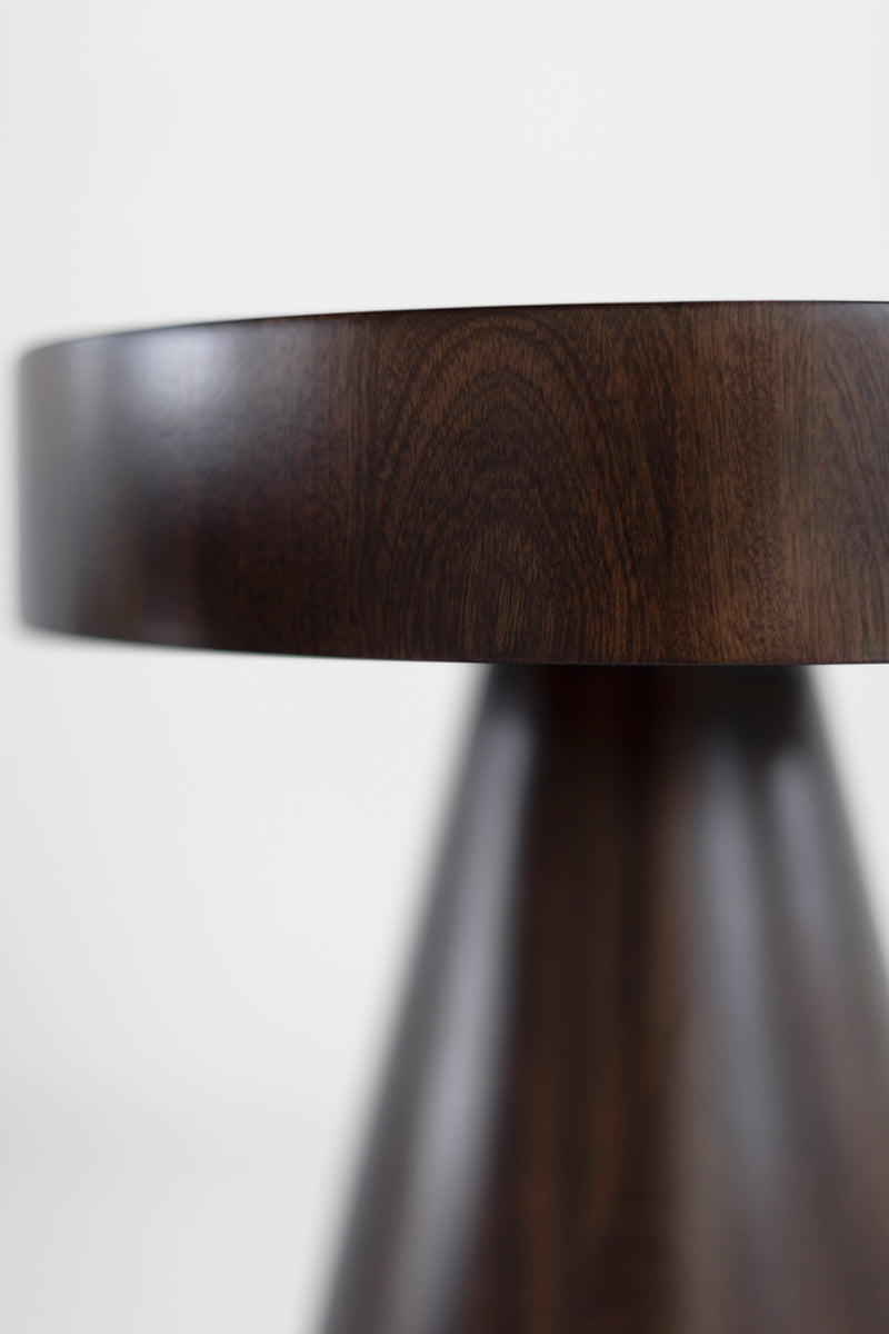 Angled view of the Outdoor Boca counter stool showing its organic, hand-sculpted silhouette.