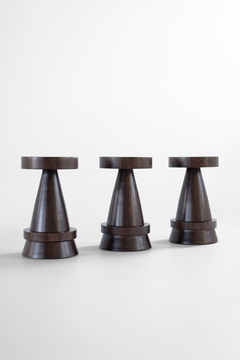 Close-up of the exterior walnut finish and wood grain on the Outdoor Boca counter stool.