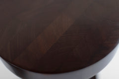 Side profile of the Outdoor Boca counter stool showing its solid trunk base.