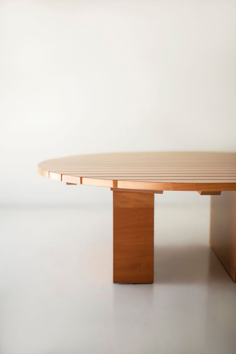 Overhead view of a round Suelo coffee table showing the tabletop