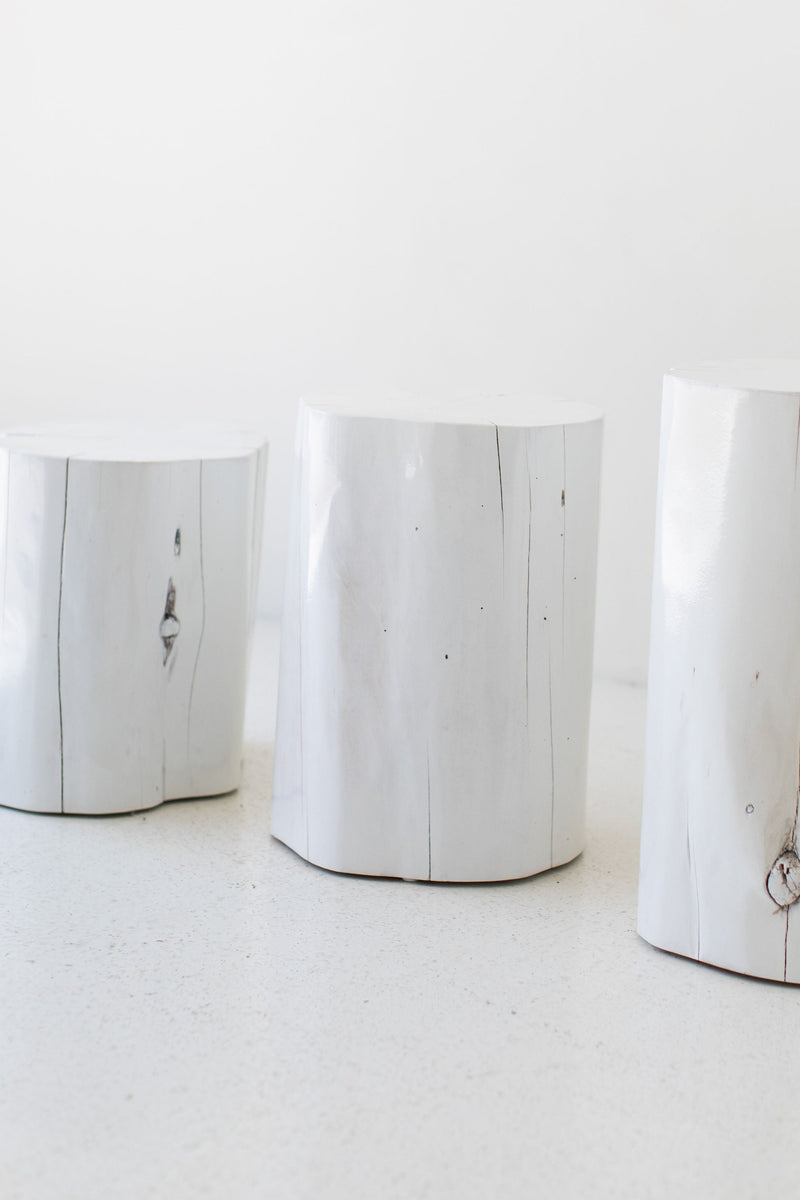 Whitewash outdoor red cedar stump tables, close view