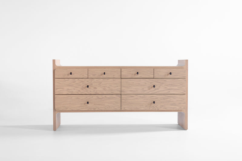 Modern luxury Parker dresser in weathered oak with soft-close drawers and handmade metal pulls, front view