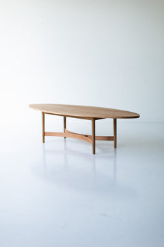 Modern luxury oak coffee table styled with books and decor