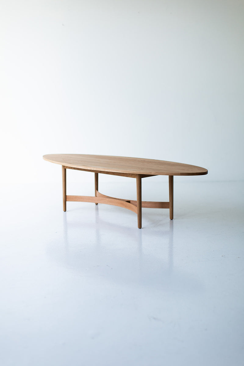 Modern luxury oak coffee table styled with books and decor
