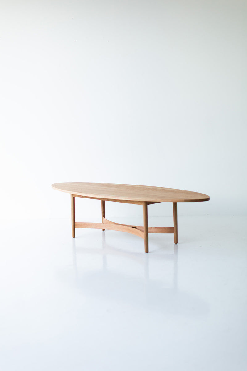 Full view of the Peabody oak coffee table against a neutral backdrop