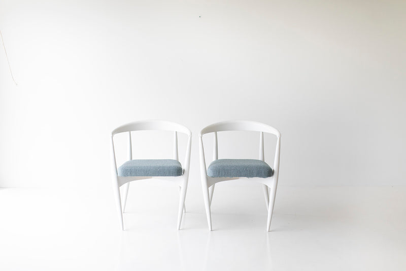 Side profile of the modern Peabody white dining armchair