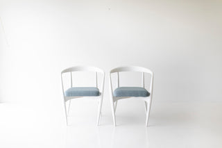 Side profile of the modern Peabody white dining armchair
