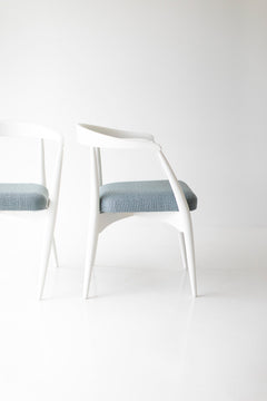 Angled view of the modern Peabody white maple armchair