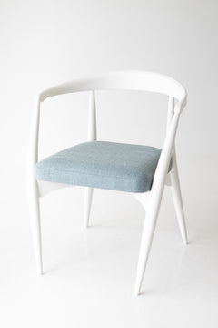 Detail of the hand-bent maple frame joinery on the dining chair