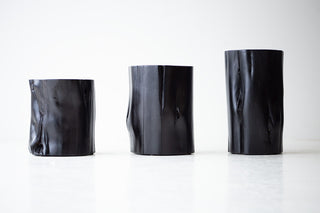 Black red cedar stumps in a row