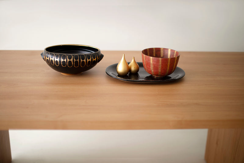 Detail of the leg and tabletop joinery on a modern wood dining table