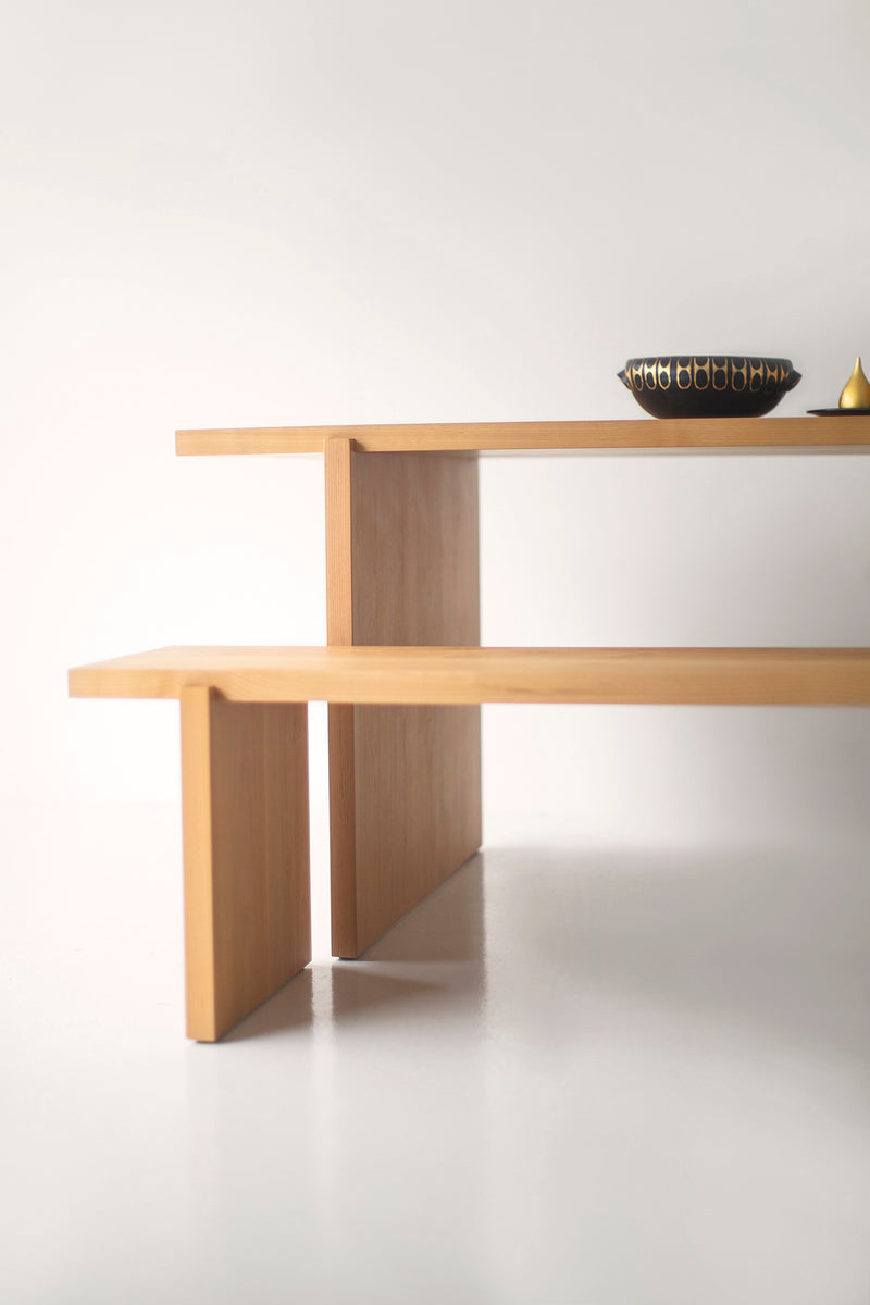 Rockefeller dining table styled in a bright dining room