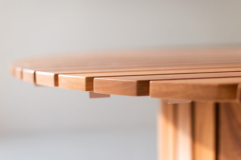 Side profile of the round outdoor dining table