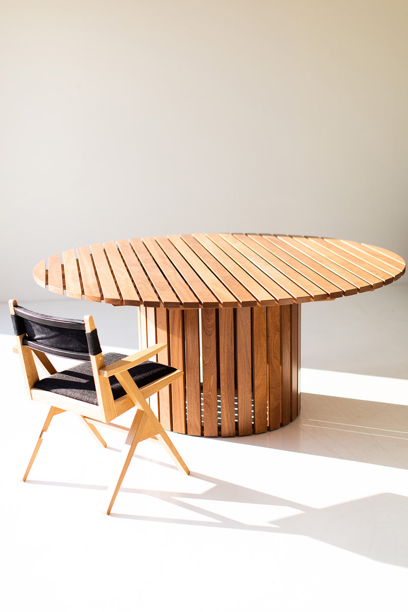 Round outdoor dining table shown from above