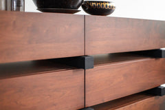 Front view of a modern luxury Santa Fe dresser with chunky walnut plank drawers