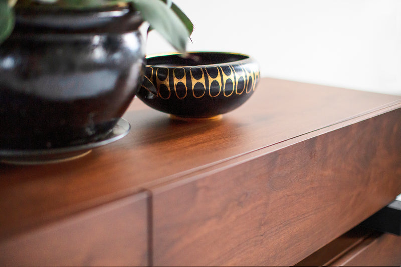 Angled view of a modern luxury Santa Fe dresser with push-to-open drawers