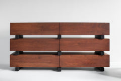Modern luxury Santa Fe walnut dresser styled in a bedroom with decor on top