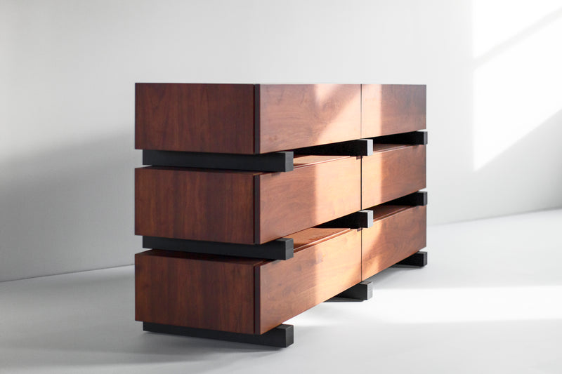 Open drawer view of a modern luxury Santa Fe walnut dresser with poplar interior