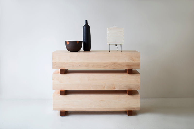 Front view of a Santa Fe maple dresser showing its chunky drawer detailing