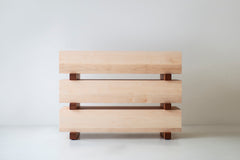 Detail of the horizontal maple planks between drawers on a Santa Fe dresser
