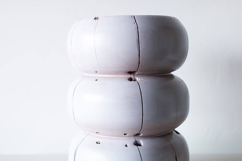 Bertu Home whitewash stump table shown at an angle