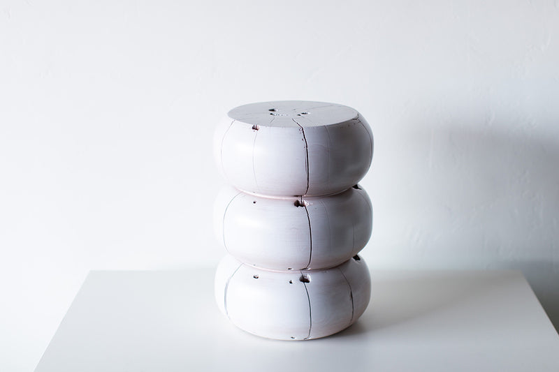 White stump tables grouped together