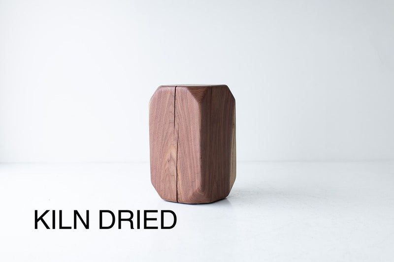 Organic modern solid walnut side table cut from a single trunk, front view
